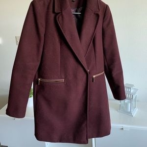 Burgundy coat, mid length, straight cut